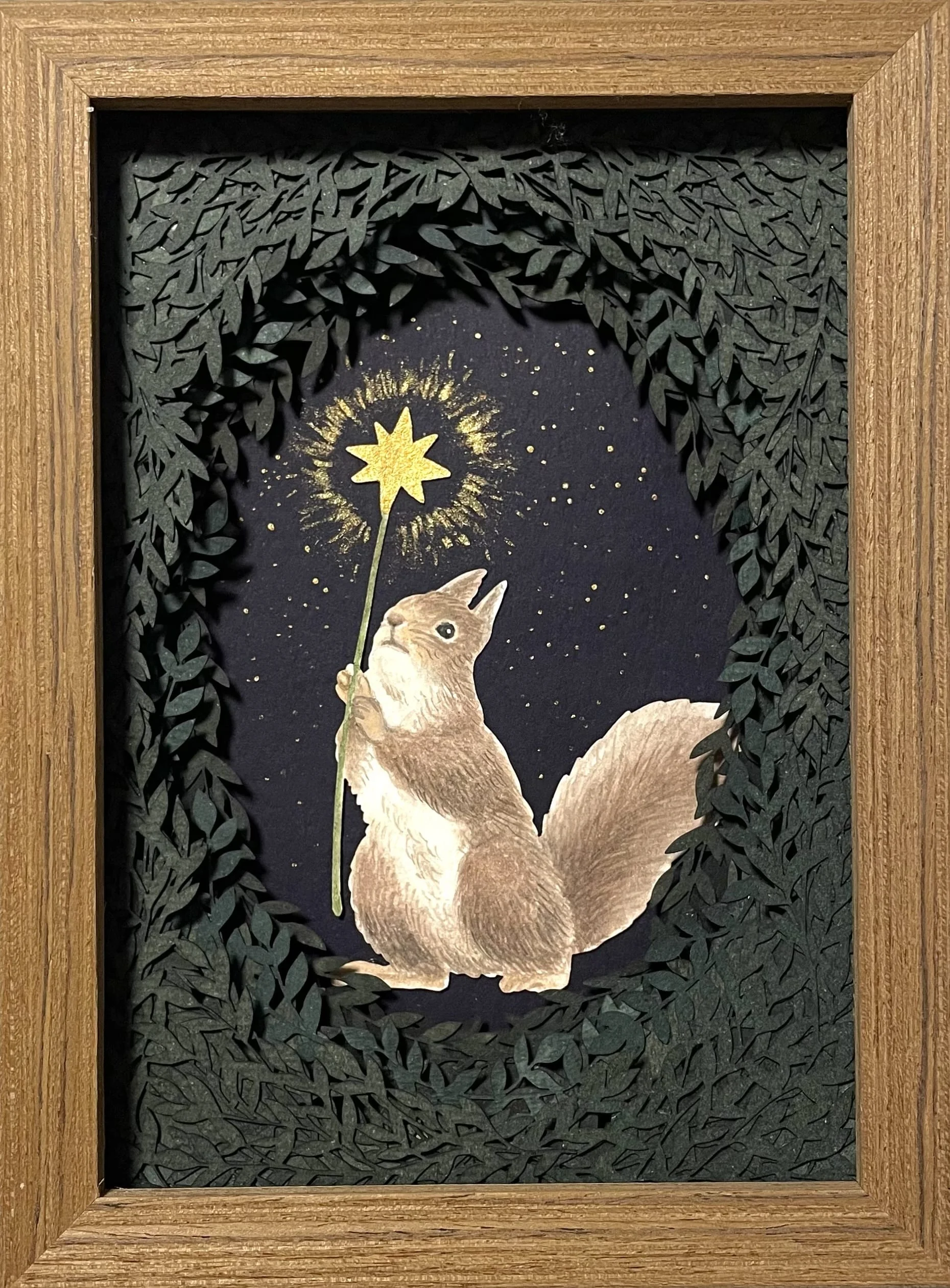 Squirrel collage with glowing star